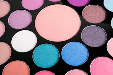 Palette of cosmetic eye shadow for make-up. Fashion and beauty background