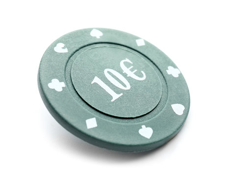 Chip for gambling games in casino on white background