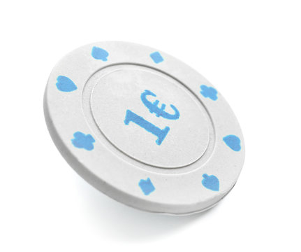 Chip for gambling games in casino on white background