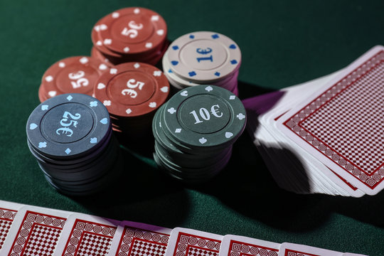 Chips and cards on table in casino