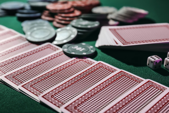Chips and cards on table in casino