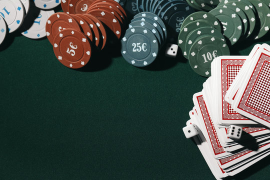 Chips and cards on table in casino