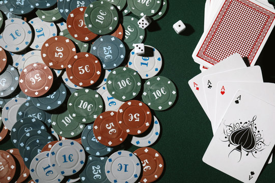 Chips and cards on table in casino