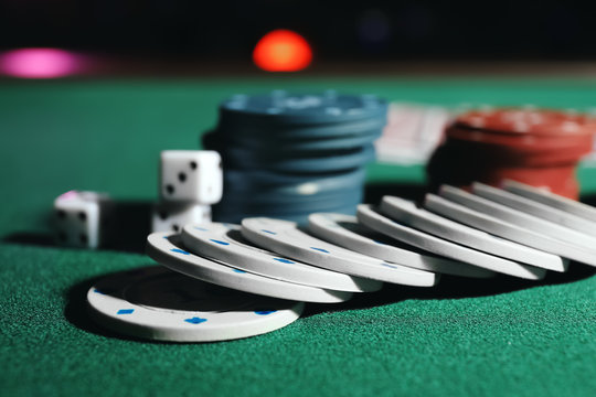 Chips for poker game on table in casino