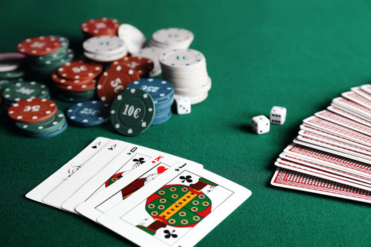 Chips and cards on table in casino