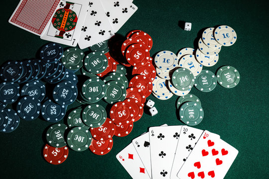 Cards and chips on table in casino