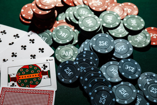 Cards and chips on table in casino
