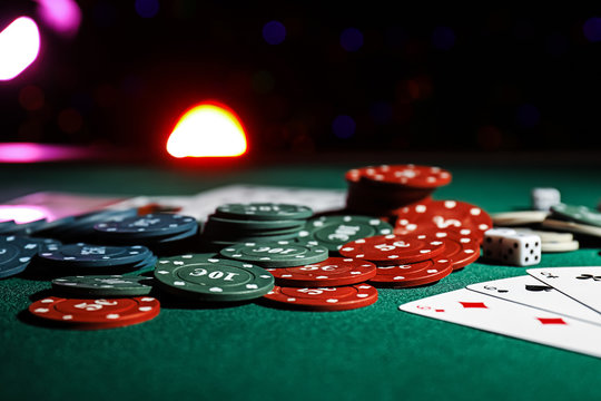 Cards and chips on table in casino