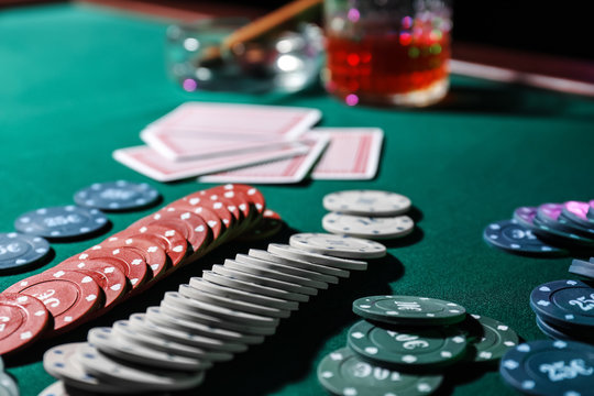 Chips and cards on table in casino
