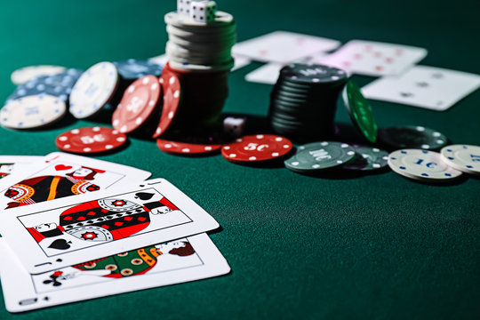 Chips and cards on table in casino