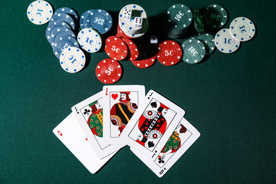 Chips and cards on table in casino