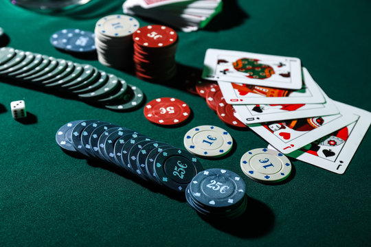 Chips and cards on table in casino