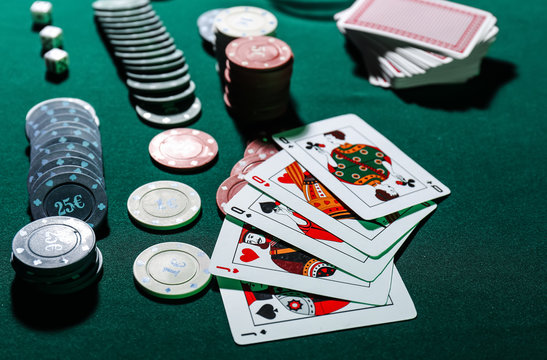Chips and cards on table in casino