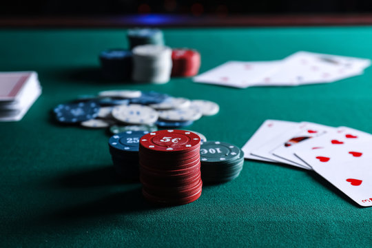 Chips and cards on table in casino