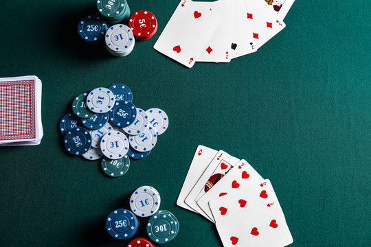 Chips and cards on table in casino