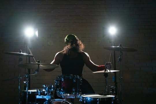 Drummer with headphones