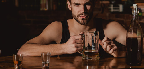 Having some beer. Alcohol addict with beer mug. Man drinker in pub. Handsome man drink beer at bar counter. Beer restaurant. Alcohol addiction and bad habit. Addicting to alcoholic drink