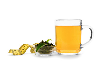 Cup of tea with measuring tape on white background. Weight loss concept