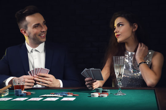 People playing cards in casino