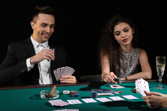 People playing cards in casino