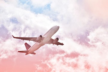Flying airplane in the skies.