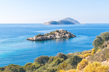 Small rocky island in Ufakdere, Kas, Antalya, Mediterranean coast of Turkey