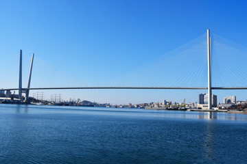 Fototapeta premium Vladivostok. Golden bridge-cable-stayed bridge over The Golden horn Bay in winter