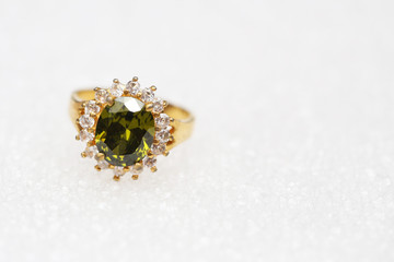 Beautiful gold ring with green gemstone