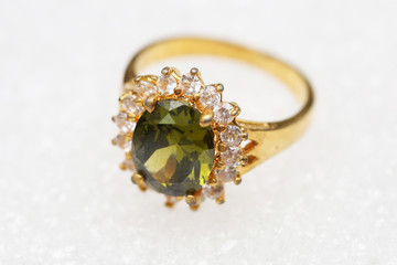 Beautiful gold ring with green gemstone