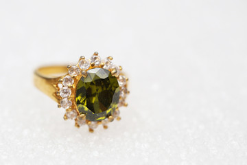 Beautiful gold ring with green gemstone