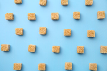 Many sugar cubes on color background