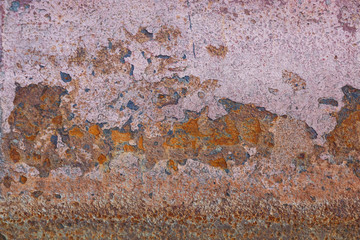 Rusty hull surface of a ship as a backdrop or backdrop