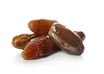 Sweet dried dates on white background