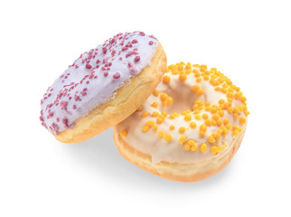 Sweet tasty donuts on white background