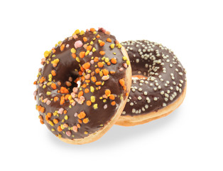Sweet tasty donuts on white background