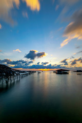 Fototapeta premium Sunset on the sea with beautiful clouds on blue sky at Yo island, Songkhla, Thailand.