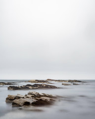 waves breaking on the rocks