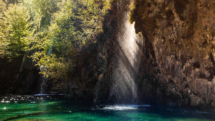 Sunbeam hits Waterfall at Plitvice National Park in Croatia