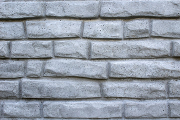 Background concrete wall. Brick imitation