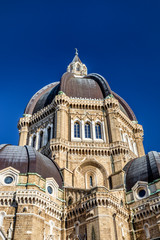 Fototapeta premium Cathedral of San Pietro Apostolo, also known as Duomo Tonti, by Paolo Tonti, who donated his wealth for its construction. Exterior of the dome and the apses. Cerignola, Puglia, Italy.