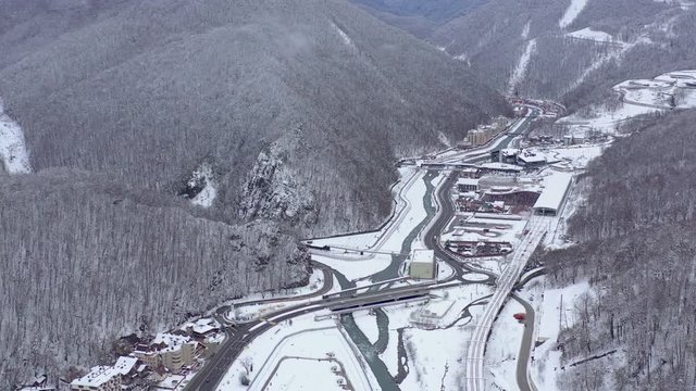 Aerial view of ski resort Gorky Gorod in Caucasus Mountains, Sochi, Russia. Mountain roads from above.