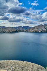 Beautiful landscape with stone rock mountains oraund of the Sibiny lakes (RU: Sibinskiye Ozora: Sadyrkol, Tortkara, Shalkar, Korzhynkol), neer the city of Oskemen (RU: Ust-Kamenogorsk) East Kazakhstan