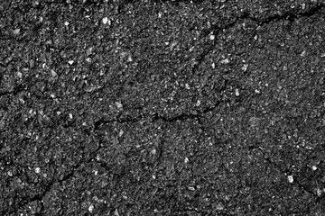 crack and texture of asphalt road - top view background.