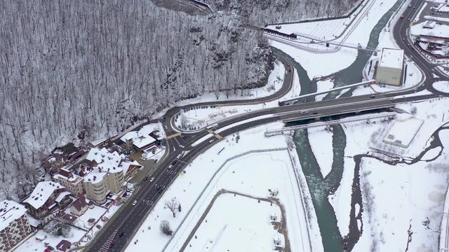 Aerial view of ski resort Gorky Gorod in Caucasus Mountains, Sochi, Russia. Mountain roads from above.