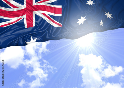 National flag of Australia hoisted outdoors with sky in background. Australia Day Celebration