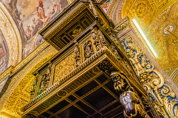 Fototapeta na wymiar St John's Co-Cathedral a gem of Baroque art and architecture interior. Valetta, Malta