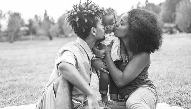 Happy Black Family Having Fun Doing Picnic Outdoor