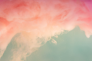 Abstract pastel pink color paint with pastel blue background.. Fluid composition with copy space. Minimal natural luxury.