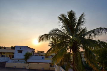 Fototapeta na wymiar Sunset view from the top of the south Indian home home