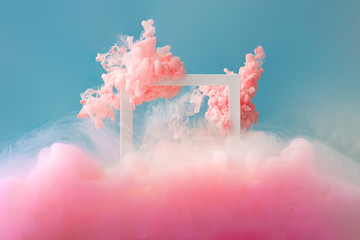 Abstract pastel pink color paint with pastel blue background.. Fluid composition with copy space....